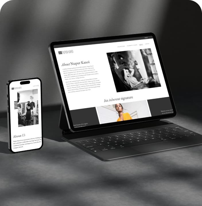 Nupur Kanoi website shown on a tablet and phone in dramatic shadow